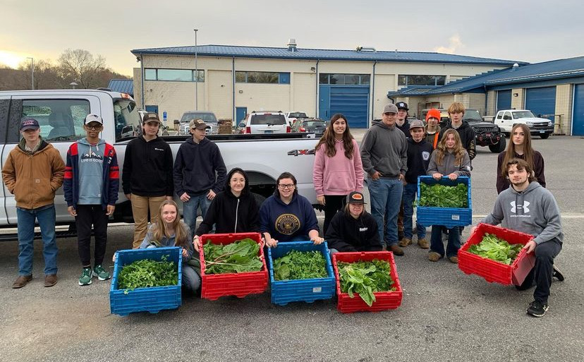 Volunteerism is at the heart of NHS student activities. Pictured here, NHS students in Farm to Table harvest crops for community food banks. 