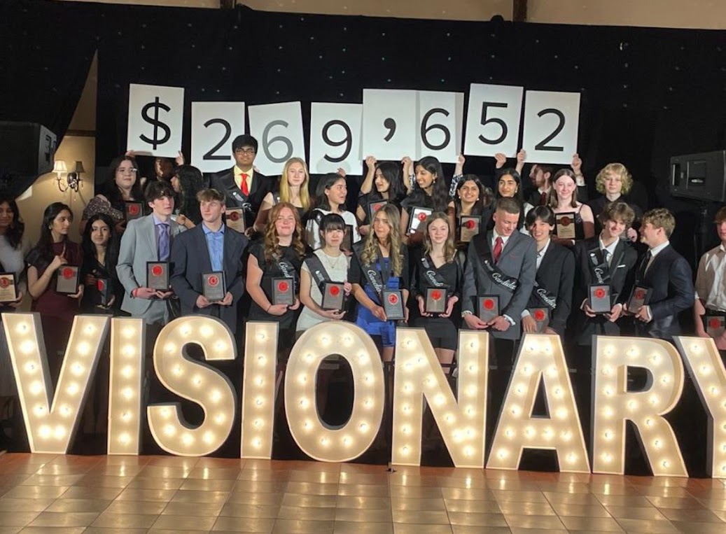Each+year%2C+NHS+students+come+together+to+raise+money+for+the+Leukemia+and+Lymphoma+Society.+Being+one+of+the+most+student+led+organizations+in+the+school%2C+the+students+successfully+raise+%2430%2C125+this+year+alone.+To+do+this%2C+the+team+hosted+a+red-out+spirit+week%2C+ran+numerous+fundraisers%2C+and+had+the+NHS+community+participate+in+STALL%2C+a+two+day+event+allowing+students+and+faculty+to+donate+money+to+stall+class+time.+After+these+accomplishments%2C+juniors+Gavin+Sandor+and+Andrew+Grivner%2C+along+with+the+rest+of+the+NHS+team%2C+attended+a+banquet+alongside+various+LLS+members+across+the+state+to+celebrate+the+amount+of+money+they+had+raised.+%28Courtesy+of+Gavin+Sandor+and+Andrew+Grivner%29