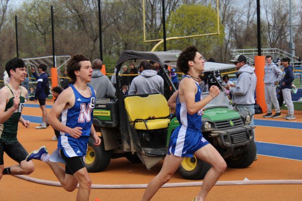 Senior captain, Ethan Perez, is in the front during the first lap of the boys steeplechase. Budris closely followed behind him after the first water barrier was jumped.