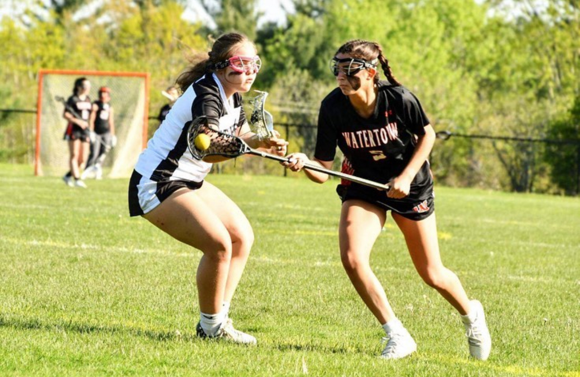Northwest Uniteds Mariah Manzano, a sophomore at Nonnewaug, defends against Watertown. Underclassmen often have to deal with obstacles of getting rides to practices and games played at Litchfield High, the host of the lacrosse co-op. (Courtesy of Northwest United Lacrosse)