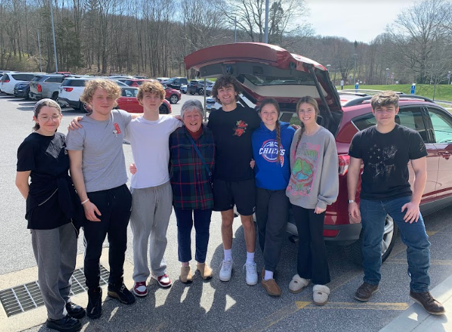 NHS Advanced Culinary students load the trunk of Bethlehem resident and Board of Ed Member Carol Ann Brown prior to Brown delivering the soup to the community Senior Center. 