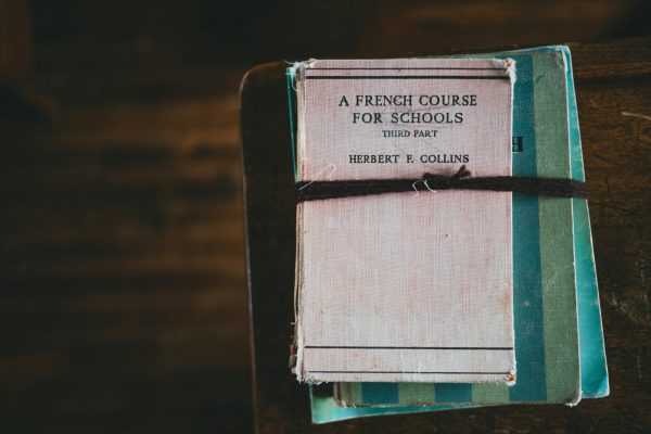 Old textbooks arent the only way to learn a world language like French, but becoming biliterate has plenty of tangible and intangible benefits. (Courtesy of Erik Mclean/Unsplash)