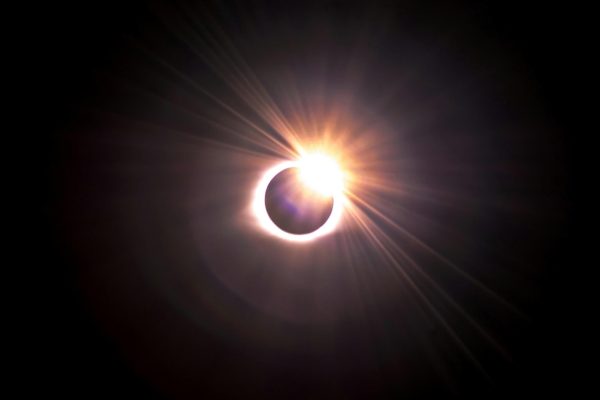 The solar eclipse happening mid-afternoon April 8 will slightly impact Nonnewaugs athletics schedule. (Courtesy of Justin Dickey/Unsplash)