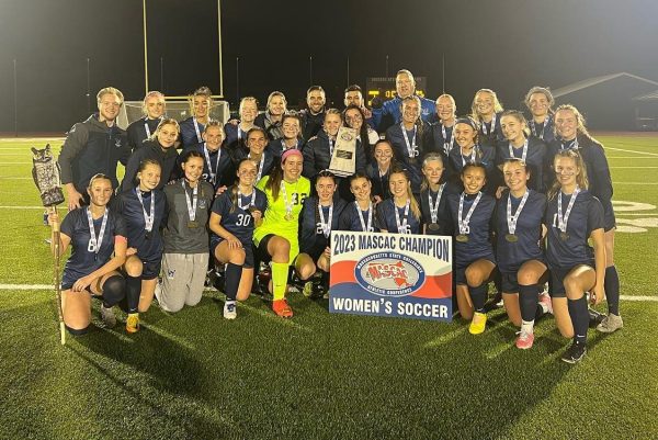 2022 Nonnewaug graduate Paige Brandt, front row, second from left, poses with her Westfield State soccer team after the Owls won the 2023 championship of the Massachusetts State Collegiate Athletic Conference, a league in Division III. Brandt plays three sports in college, something she wouldnt be able to do at the Division I level. (Courtesy of Westfield State Womens Soccer/Instagram)