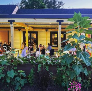 Good News Café, originally opened in 1994, has been a community favorite in Woodbury for 3 decades. The pergola was added during the Covid-19 pandemic so customers could still enjoy the taste of Good News while safety precautions were in place. (Courtesy of Eileen Colangelo)