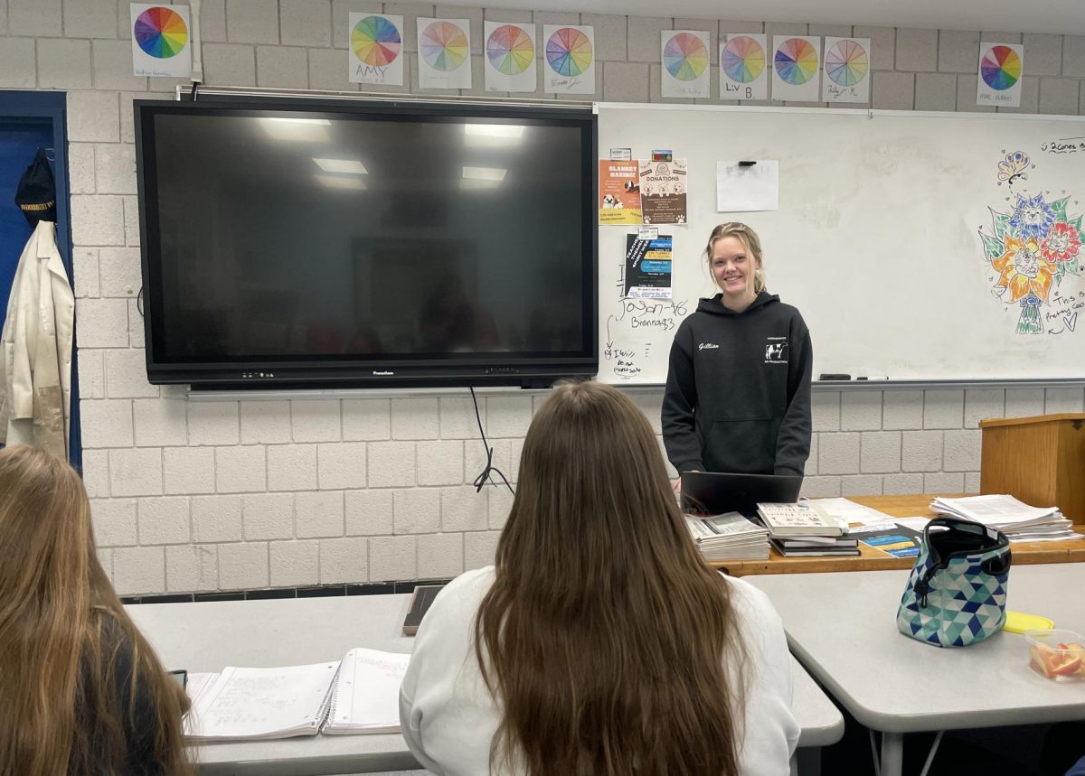 Gillian Blood stands in front of the period 3 and 4 greenhouse production class giving the class the list of sub plans and tasks while covering a class. This is only one of the classes Blood has been a sub for and the students always have a great time. 
