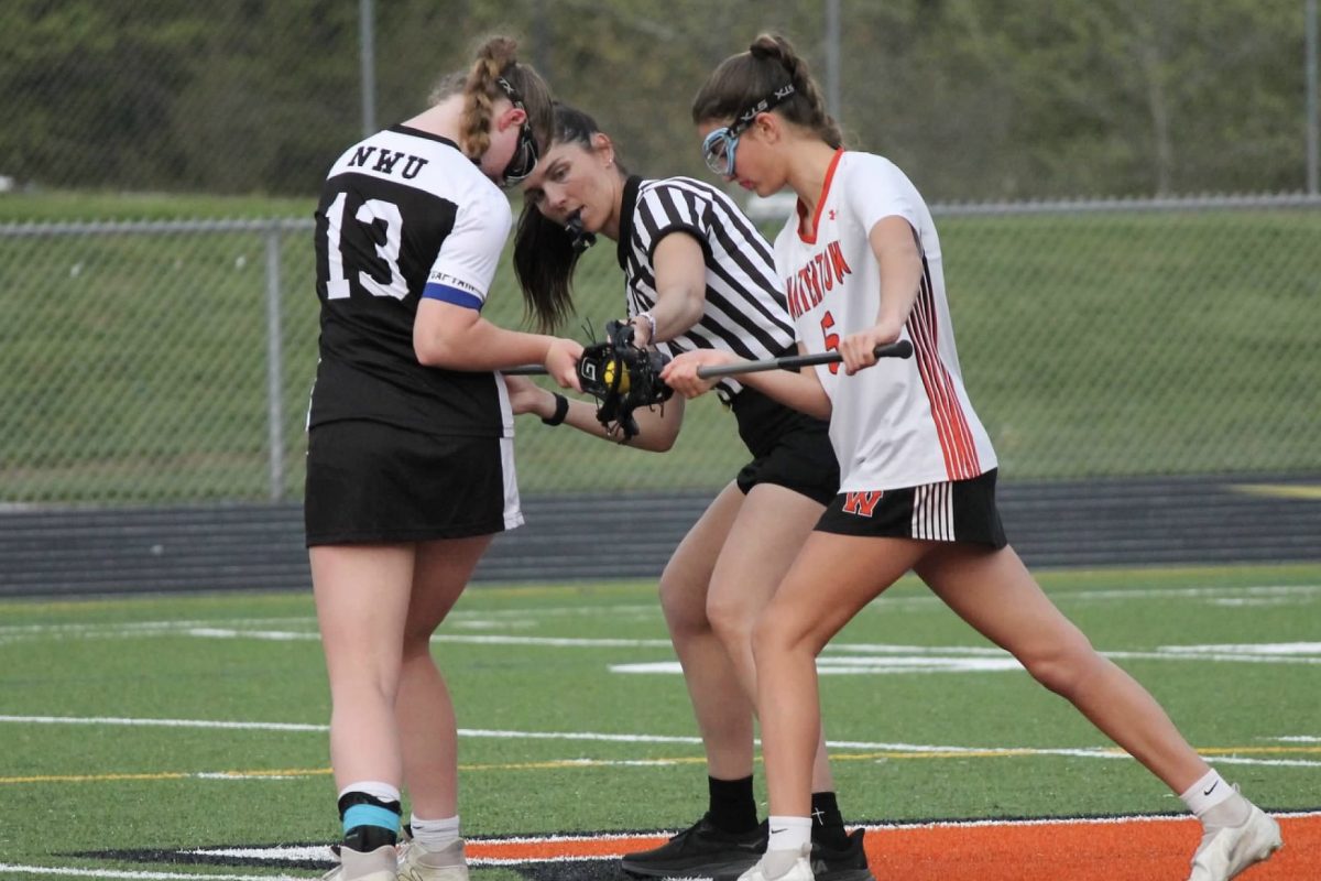 Kaitlyn Boyce (13) takes the draw during the Northwest United lacrosse game against Watertown on May 6 at Watertown. 