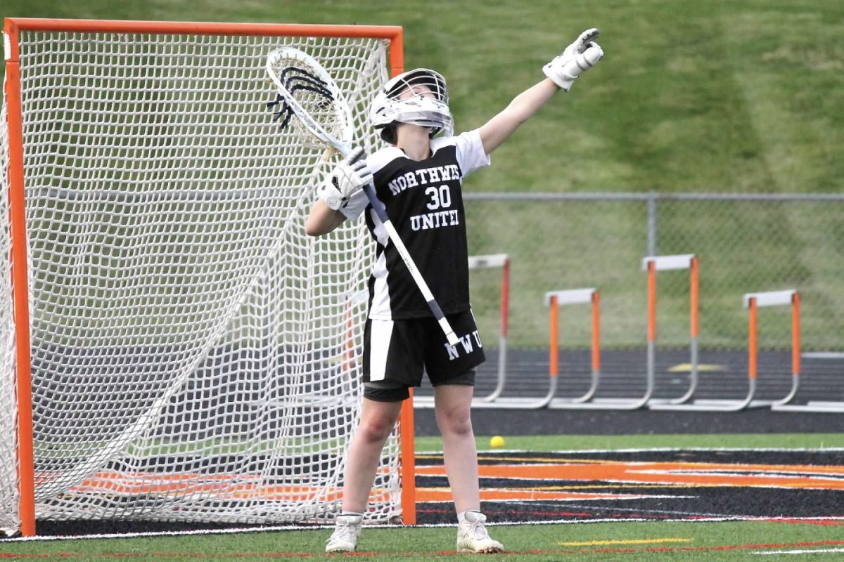 Goalie Allie Barber poses after a save during the Northwest United lacrosse game against Watertown on May 6 at Watertown. 