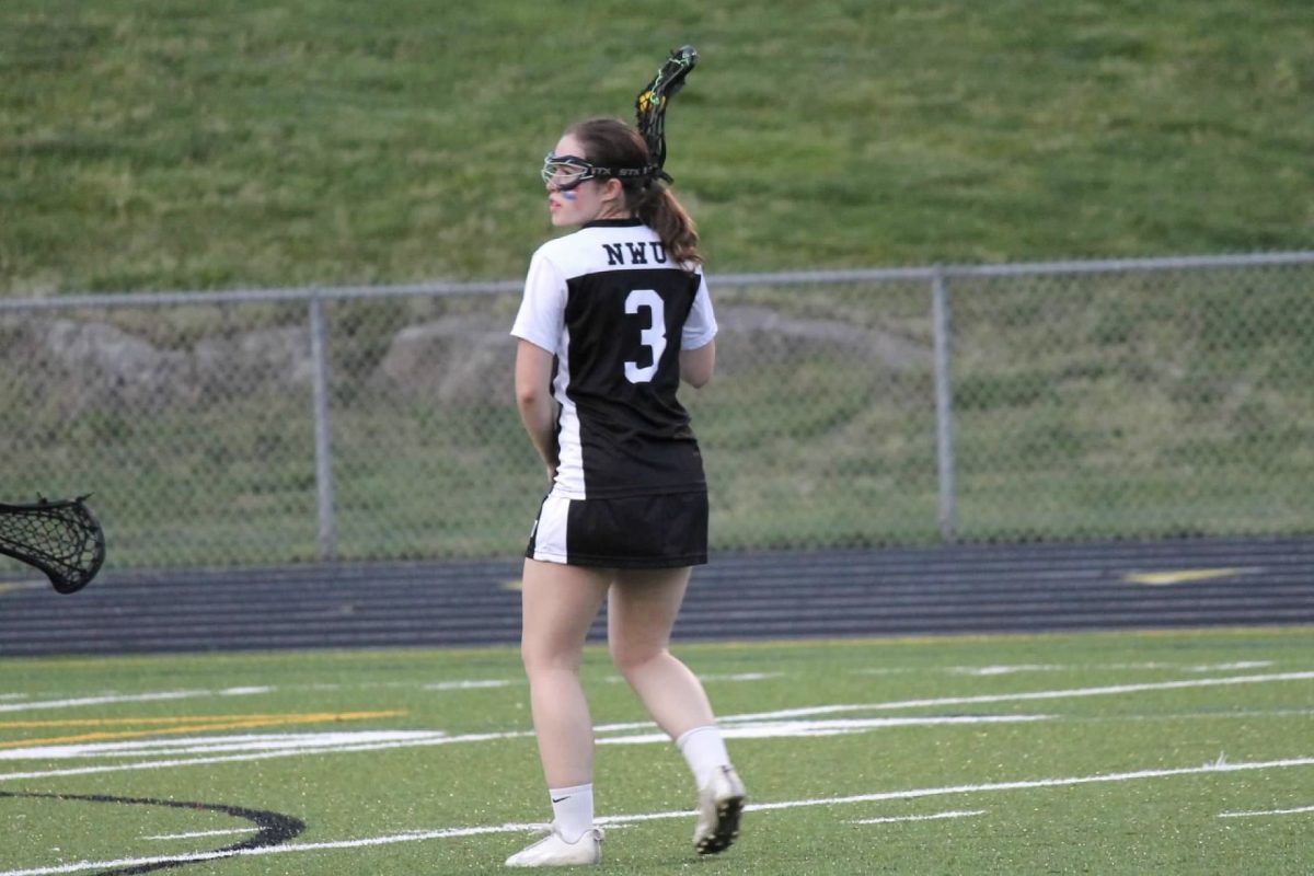 Juliann Noyd holds the ball on the field during the Northwest United lacrosse game against Watertown on May 6 at Watertown.   