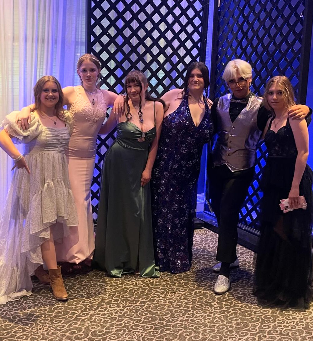 Nonnewaug students, from left, Campbell Bologna, Hannah Ringeisen, Lori Marquis, Kayleigh Gingras, Dominik  Udvardi, Vladyslava Klymenko posing for a photo during the 2024 prom. (Courtesy of Haylee Molina)