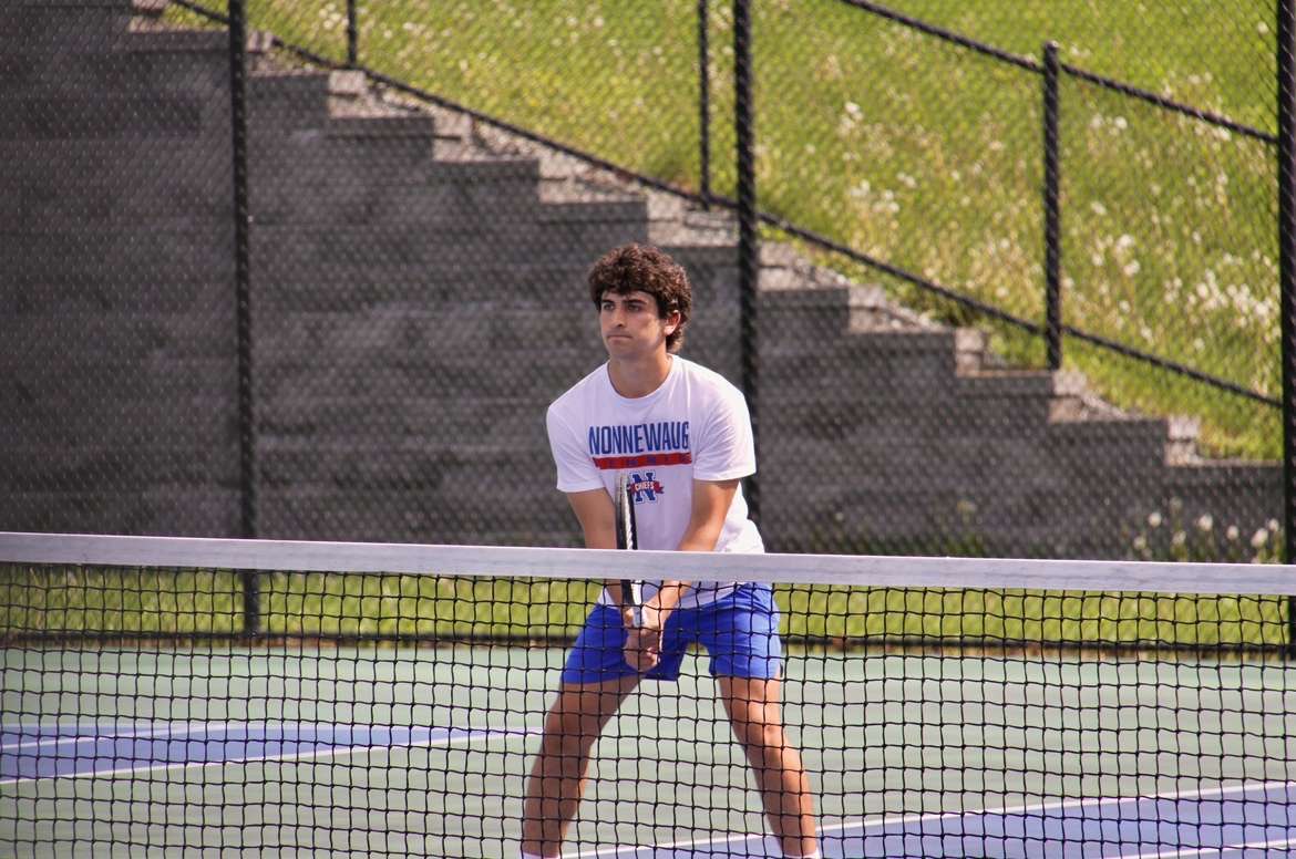 Kyle Viveros is ready on his toes, awaiting the ball. Viveros and Landon Parks took home the BL doubles title. (Courtesy of Sophia Cenatiempo)