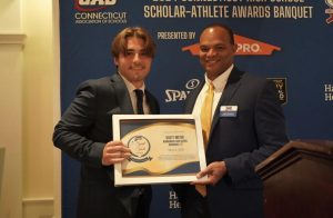 Nonnewaugs Scott Meyer, left, was honored as the recipient of the 2024 Michael H. Savage Spirit of Sport Award at the CAS-CIAC Scholar Athlete Banquet on May 5 at the Aqua Turf Club in Southington. (Courtesy of the CIAC)