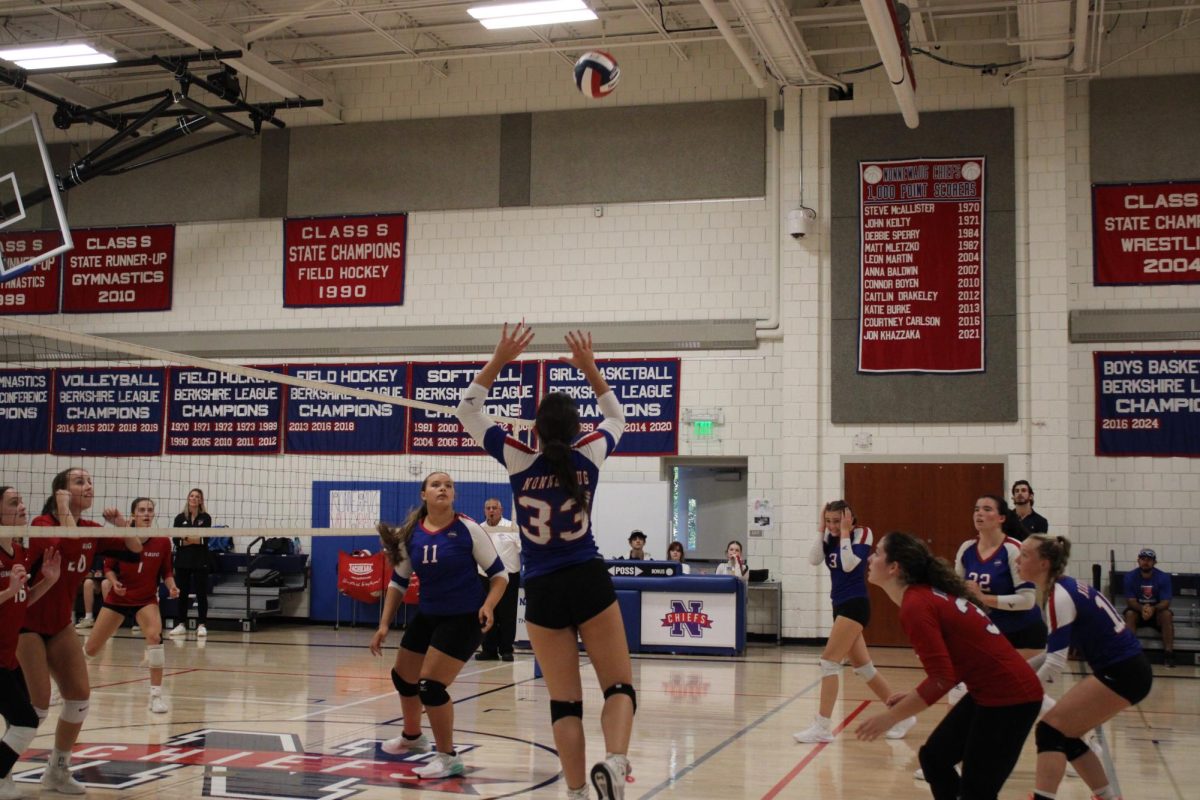 Junior, Lana Zupnick about to set the volleyball to her teammates to try to get a point in a game vs Pomperaug on Sep. 12.