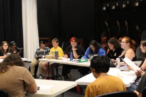 NHS drama director Catherine Pelkey facilitates a rehearsal with this fall's cast of 12 Angry Jurors. The play will feature a unique blend of returning actors alongside students that are new to the craft. 