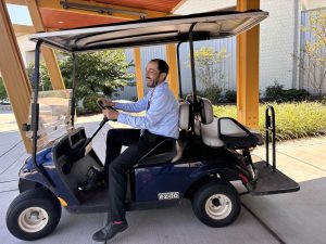 New Nonnewaug Athletic Director Andrew Tammero drives the athletics golf cart, previously belonging to now-assistant principal Declan Curtin, around the school. This new ownership signals the start of a year of changes as Tammero settles at Nonnewaug.