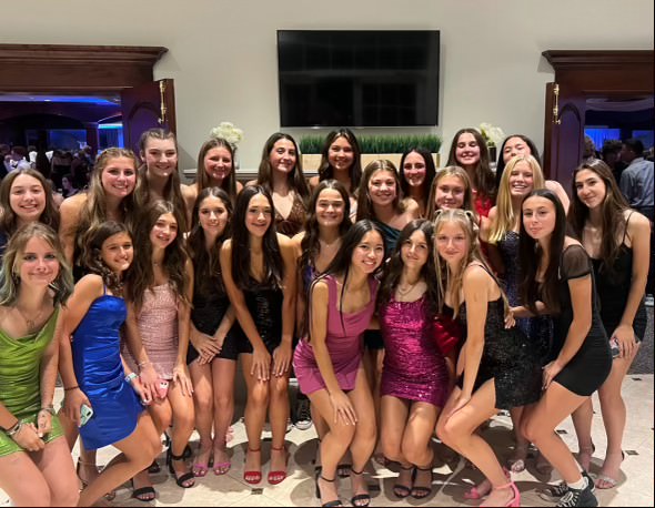 The 2023 girls soccer team prepares for last year's Homecoming Dance. This year's dance comes almost a full month earlier than last year's so attendees have had a busy September preparing. Photo credit NHS Girls Soccer. 