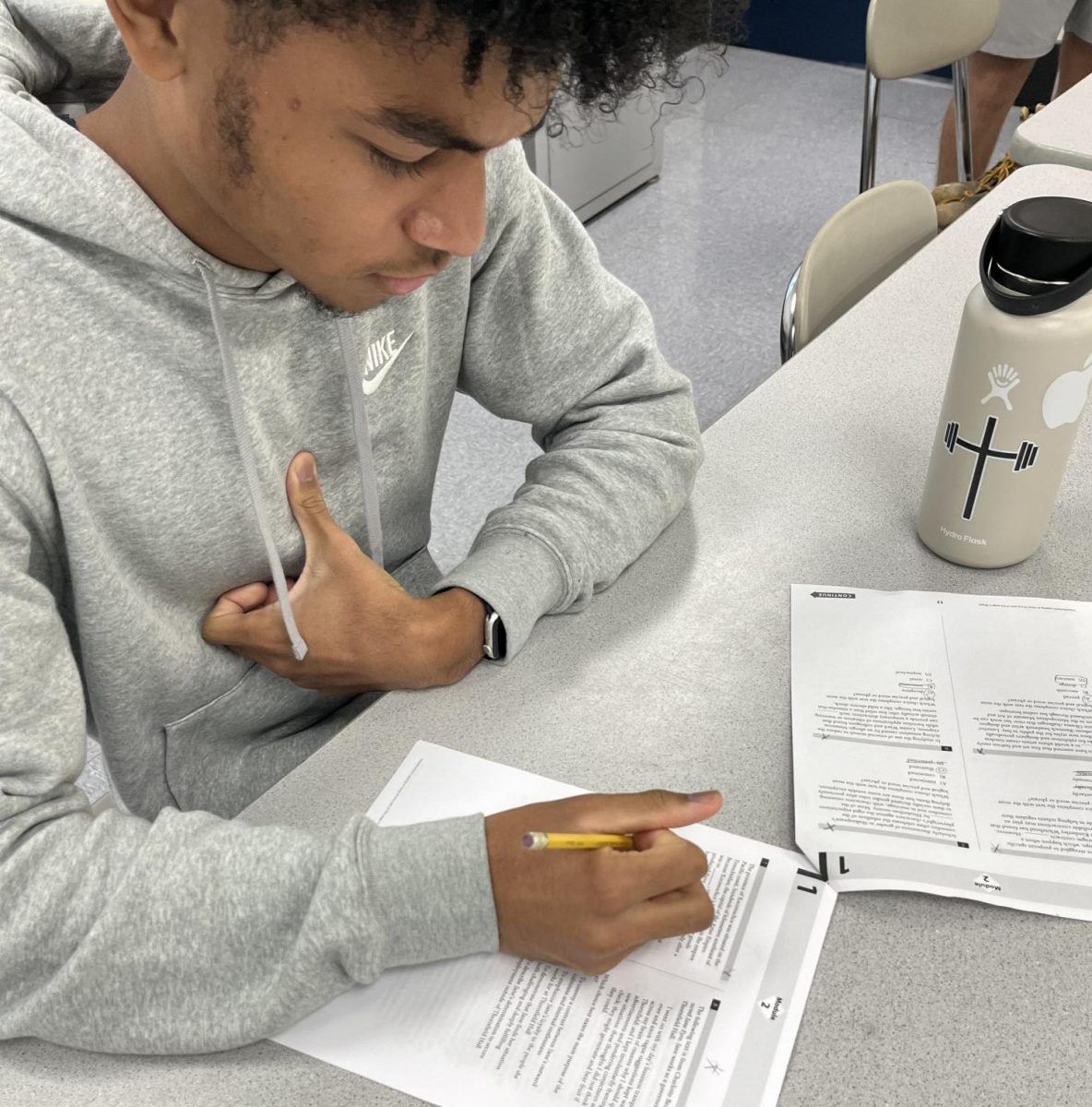 Nonnewaug Senior, Raymond Lomax, takes his time reading each section and asks questions about anything he doesn’t understand. This course has helped him and many other students feel more confident about taking the SAT, a course that is held each week leading up to the fall testing dates. 
