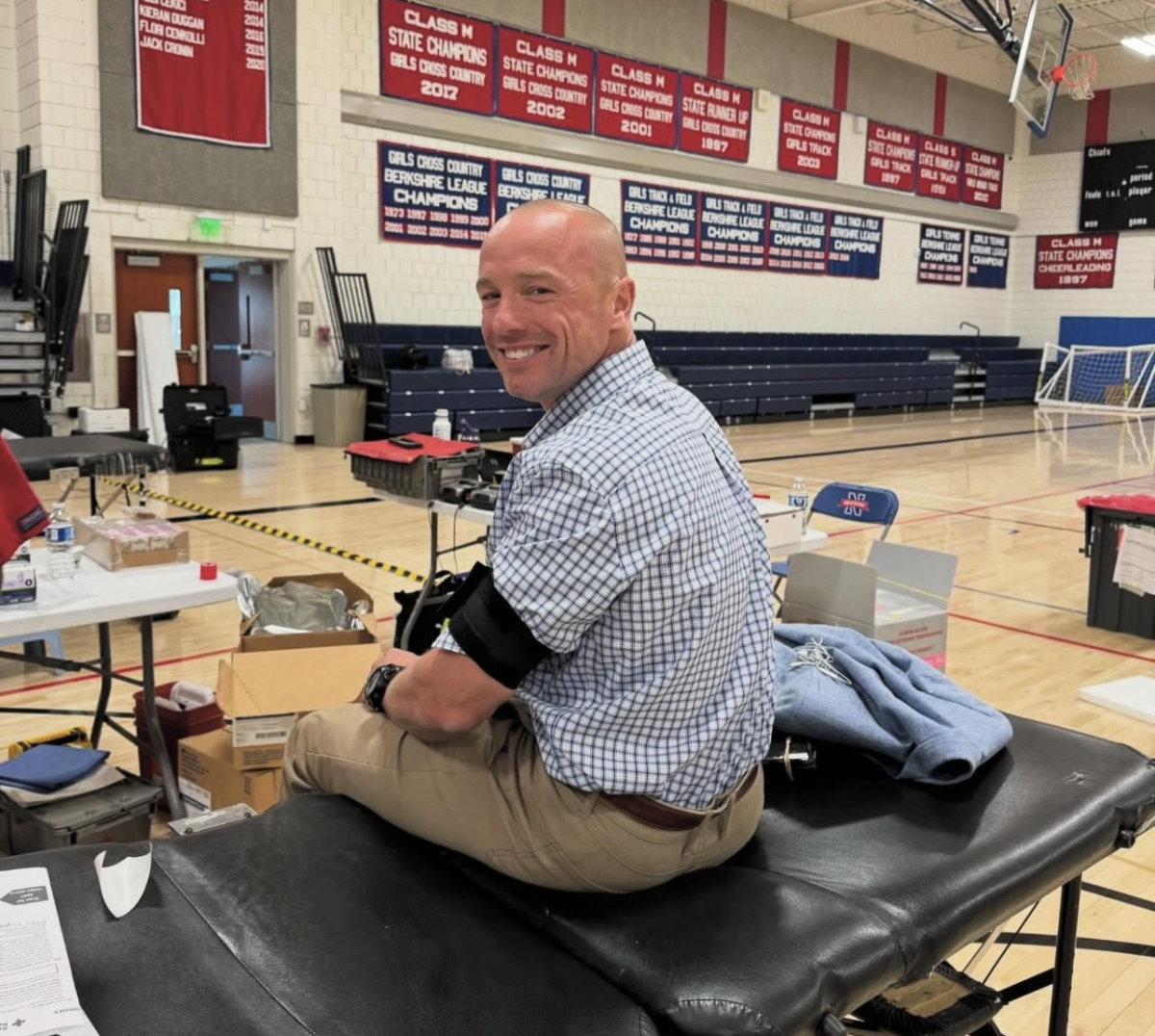 Nonnewaug principal Mykal Kuslis donates blood for the 48th time at the most recent blood drive. He said he is always happy to donate to the Red Cross and is “happy to give back.” Nothing is more gratifying than knowing (Courtesy of the National Honor Society/Instagram)
