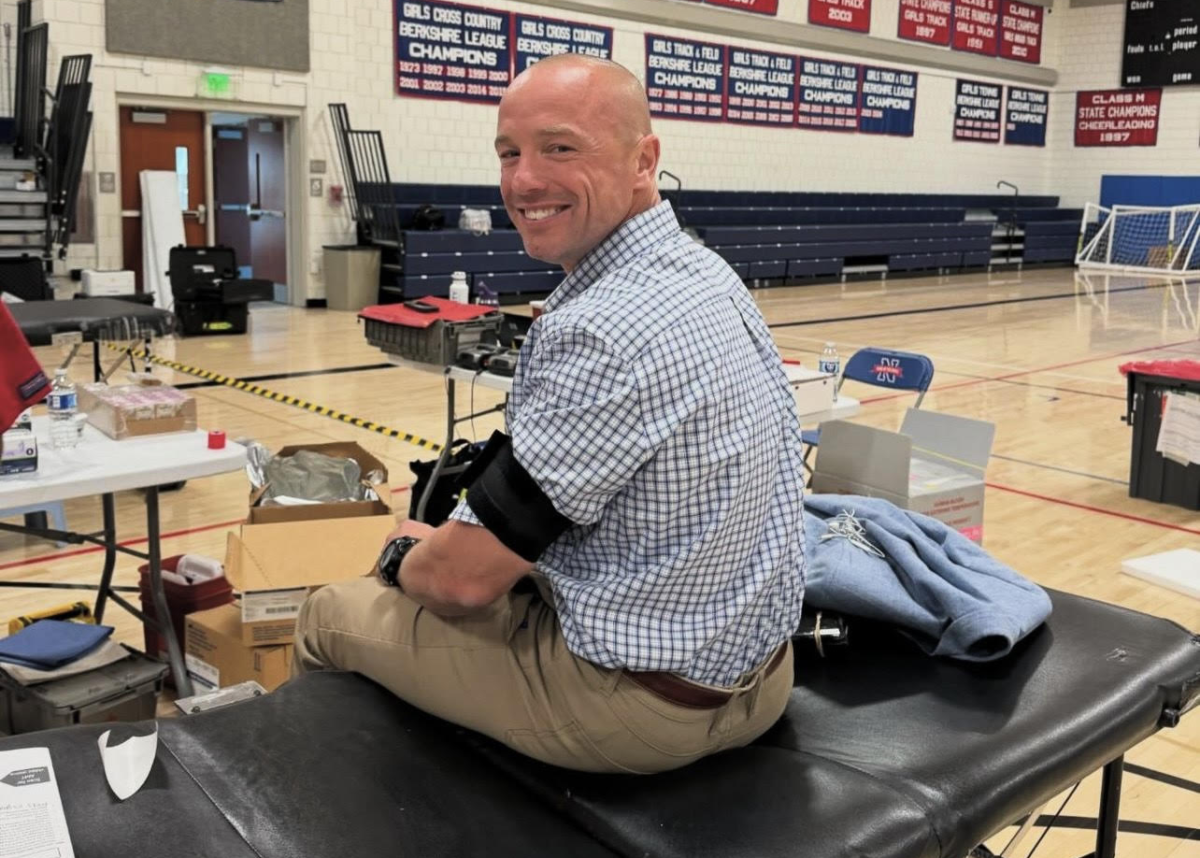 Nonnewaug principal Mykal Kuslis donates blood for the 48th time at the most recent blood drive. He said he is always happy to donate to the Red Cross and is “happy to give back.” Nothing is more gratifying than knowing (Courtesy of the National Honor Society/Instagram)
