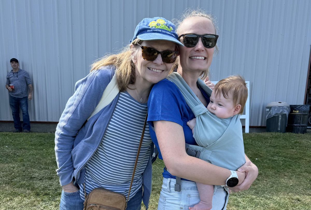 Former Nonnewaug girls basketball coach Rebecca Pope, right, holds her daughter, Mia, alongside her mother at the Bethlehem Fair. Pope is stepping down after two years leading the Chiefs. (Courtesy of Rebecca Pope)