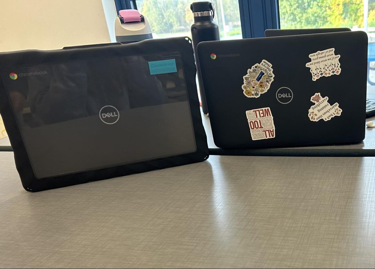 Students at Nonnewaug work during study hall. On the left, one student preferred to use the clear cases provided by the school, while the others opted for not using the case. 