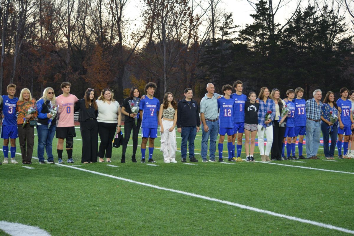 All the seniors and their families pose together before the game against Gilbert on Oct. 22.