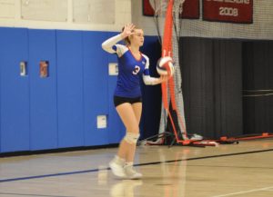 Sophomore Riley Rich prepares to serve the ball during Nonnewaug volleyball’s Berkshire League semifinal match against Housatonic on Oct. 25.