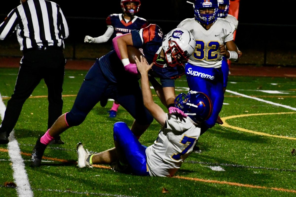 Tristan Van Dyke fights for the ball during the Northwest United Senior Night game on Oct. 26.