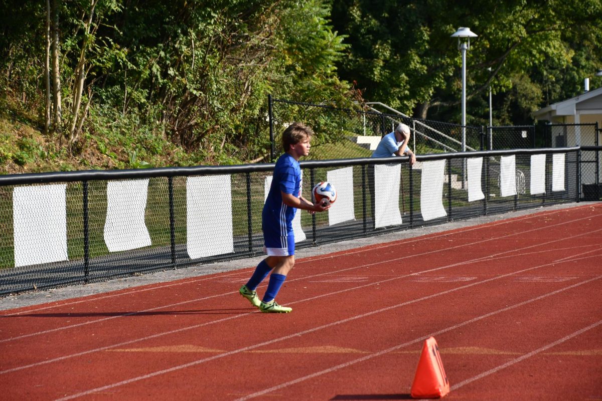 Senior soccer player Durkin Stankevich's unique flip throw-in gives the Chiefs a weapon few other teams have. (by Deme Jones '26)