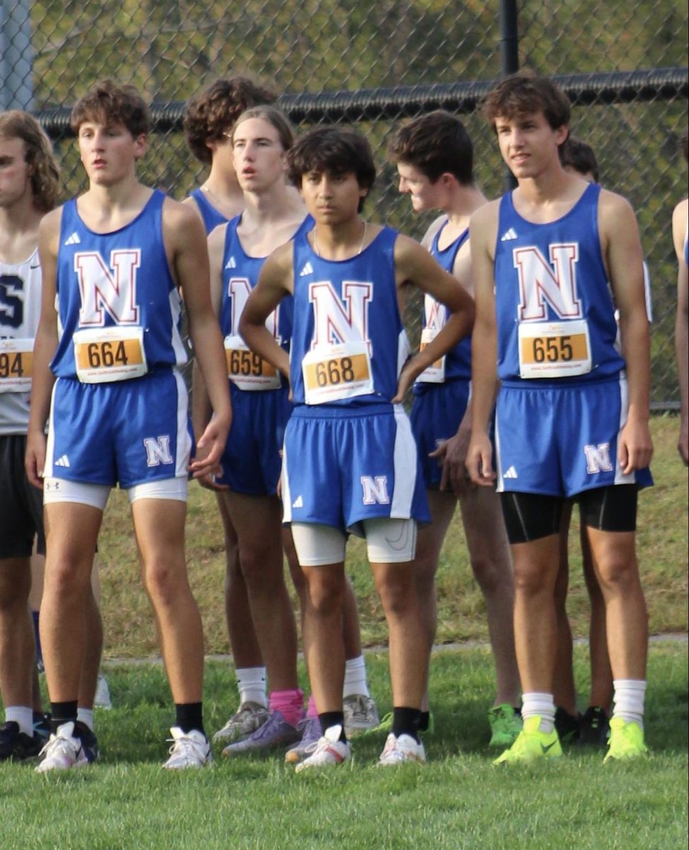 From left, Luke Lodice, Noah Spagnola and Thatcher Budris get ready to run at the Nonnewaug Cross Country  Invitational on Oct. 4. Lodice says that he feels nerves before big meets, but having supporters on the course eases the pressure.