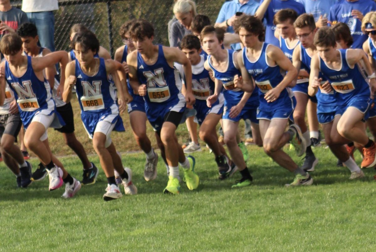 The NHS boys cross country team takes off at the Nonnewaug invitational on Oct. 4.