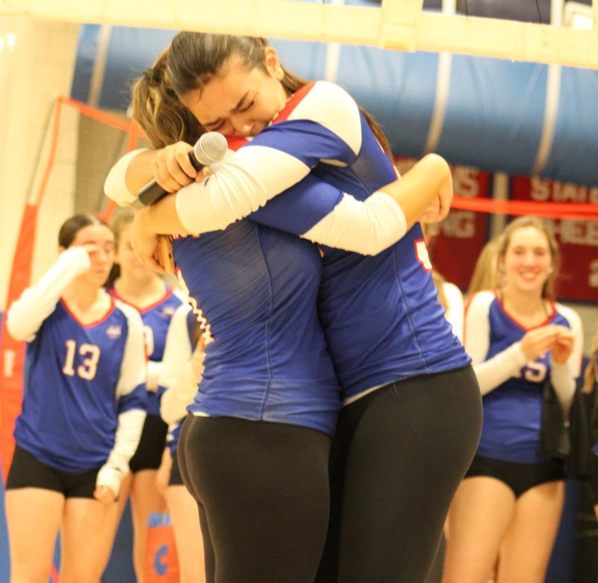 Junior Lana Zupnick and Senior Sophia Calderall hug after the speech Lana gave Sophie for her volleyball senior night on Oct. 16th 