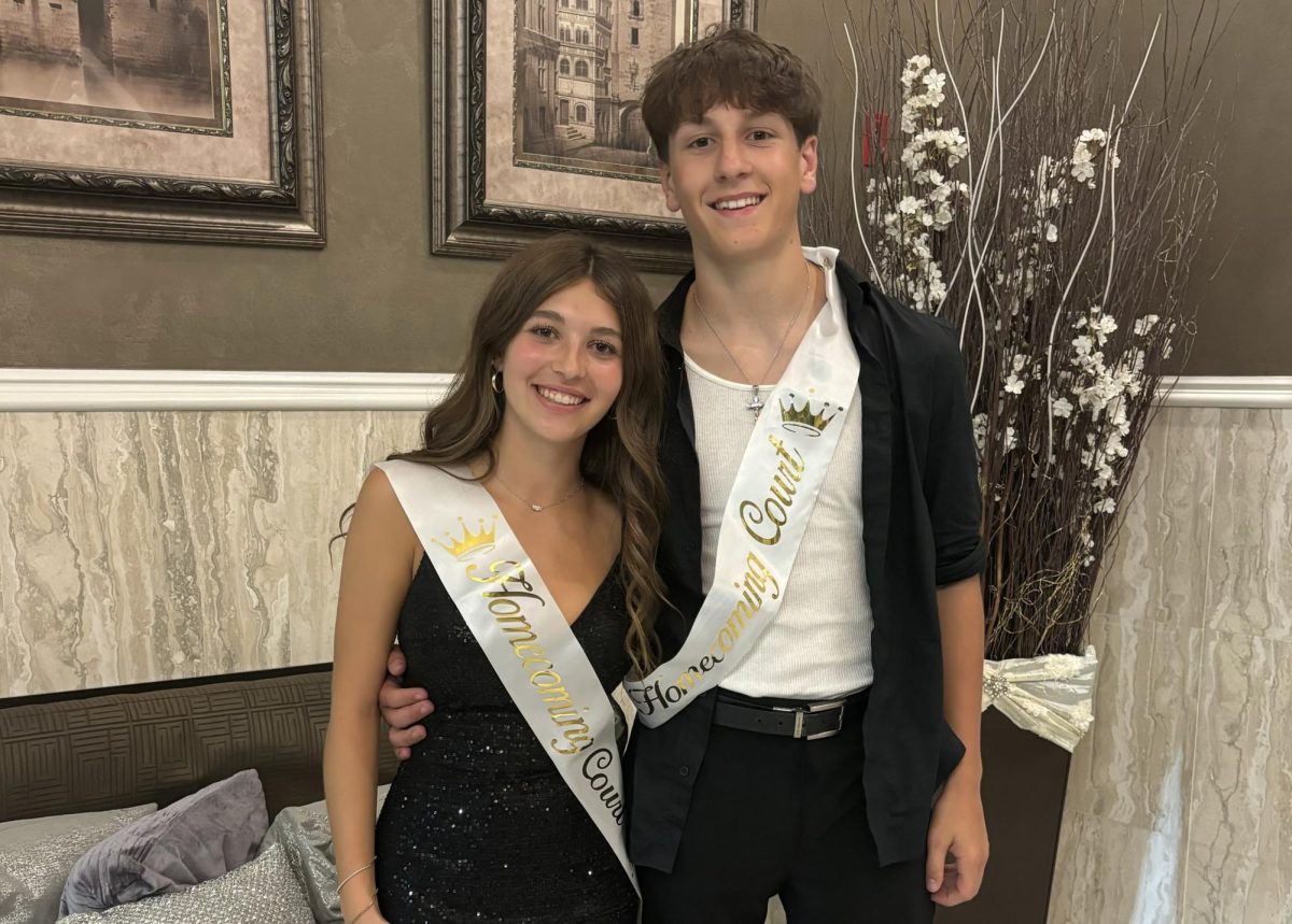 Nonnewaug sophomore Luke Lodice, left, poses with Addison Bushka at Lodice's first Nonnewaug homecoming after transferring from Oxford. (Courtesy of Addison Bushka)