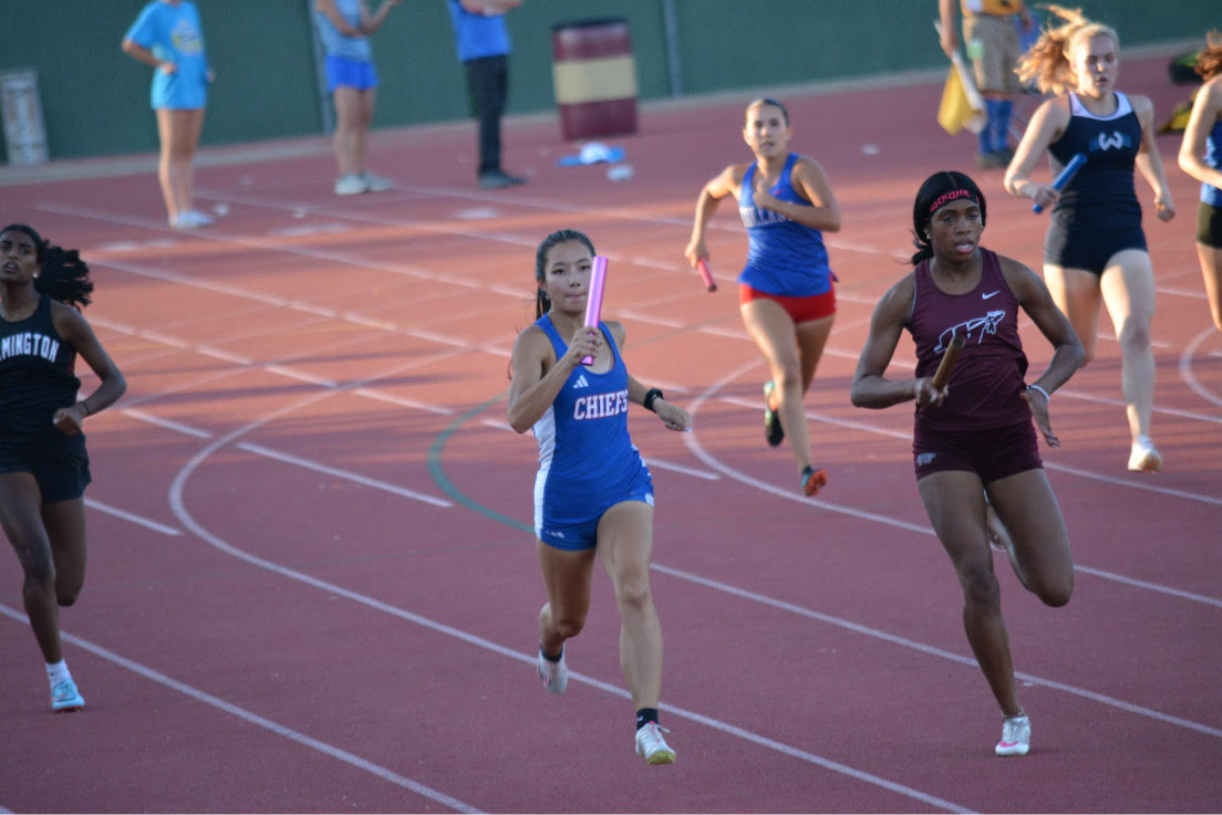 Ellie McDonald runs her leg of the 4x400-meter relay at the 2024 CIAC State Open in New Britain. McDonald, a senior at Nonnewaug, will run track at Middlebury College next year. (Courtesy of Christina Garguilo)