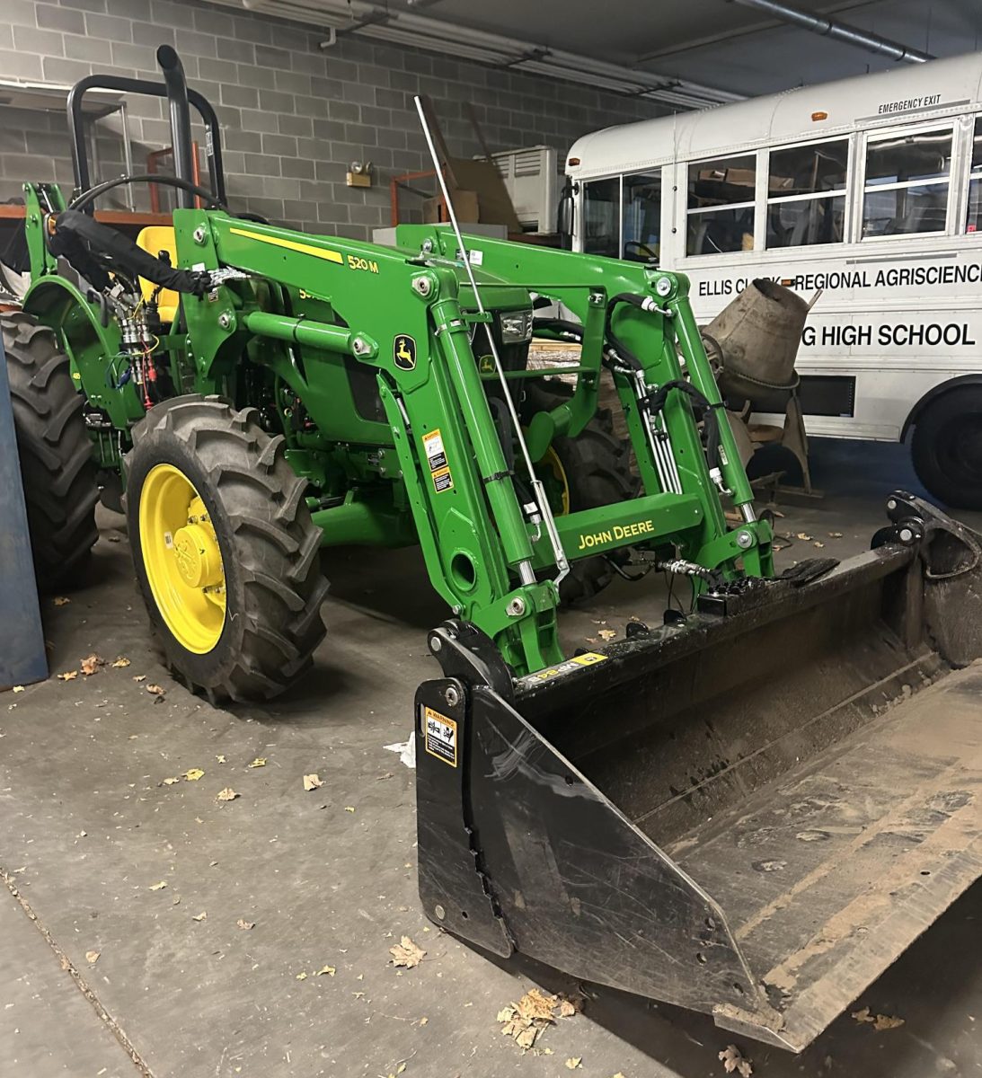 The new John Deere tractor sits in the ag garage reserving its new spot in the program. This tractor replaced the Case and old Ford. 