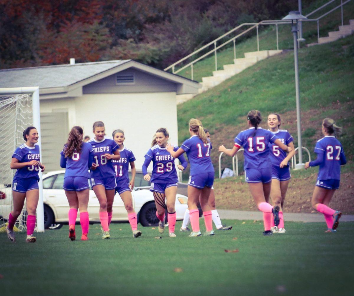 Last year's girls soccer team celebrating a goal scored on Housatonic in the semifinals. A majority of these athletes moved on from soccer to another sport in the winter but it begs the question: do fall athletes need a break before winter sports begin?  (Courtesy of Noreen Chung) 
