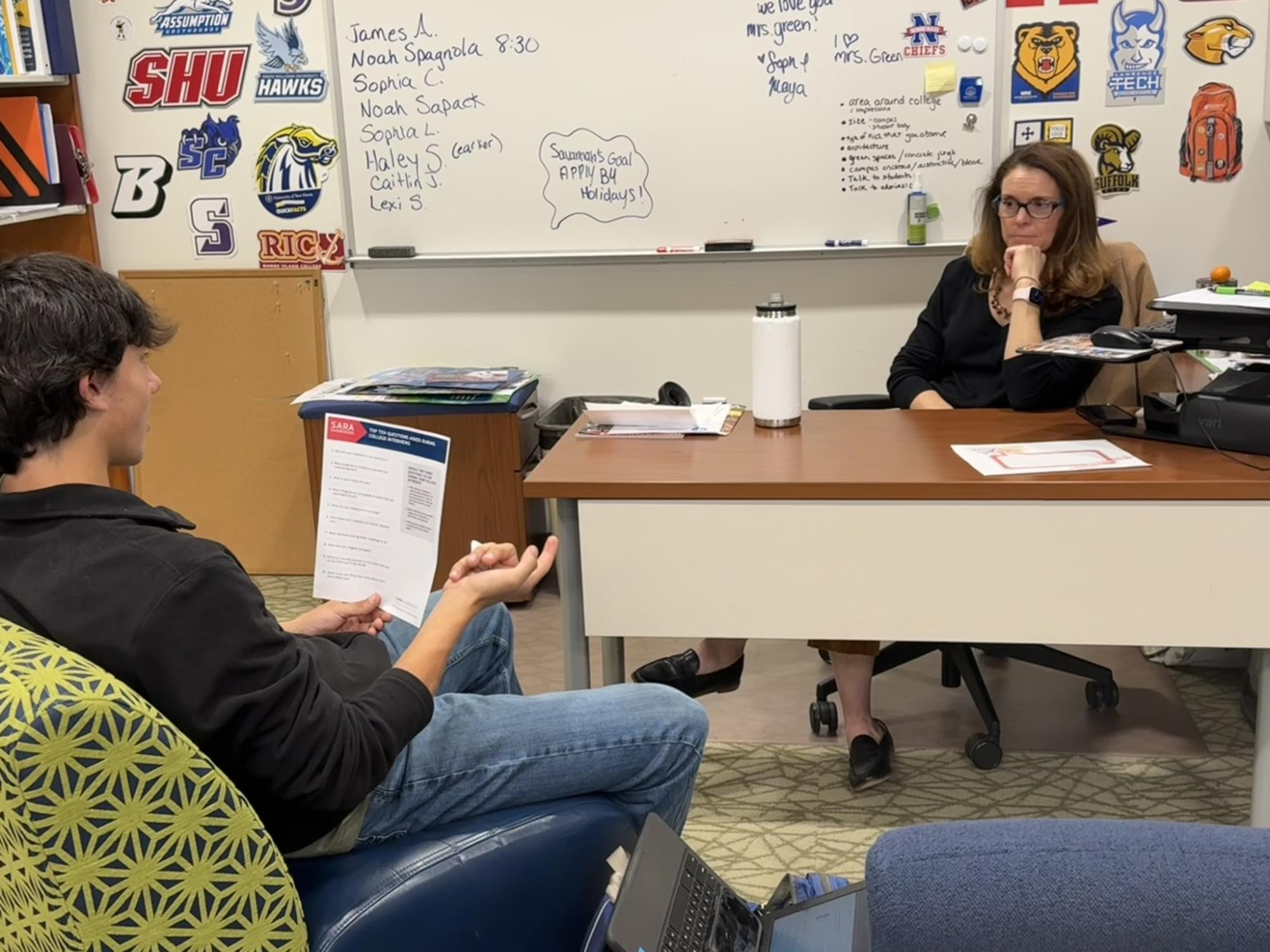 Senior Liam Sandor, left, talks about college planning with Nonnewaug CCRC counselor Kathy Green.