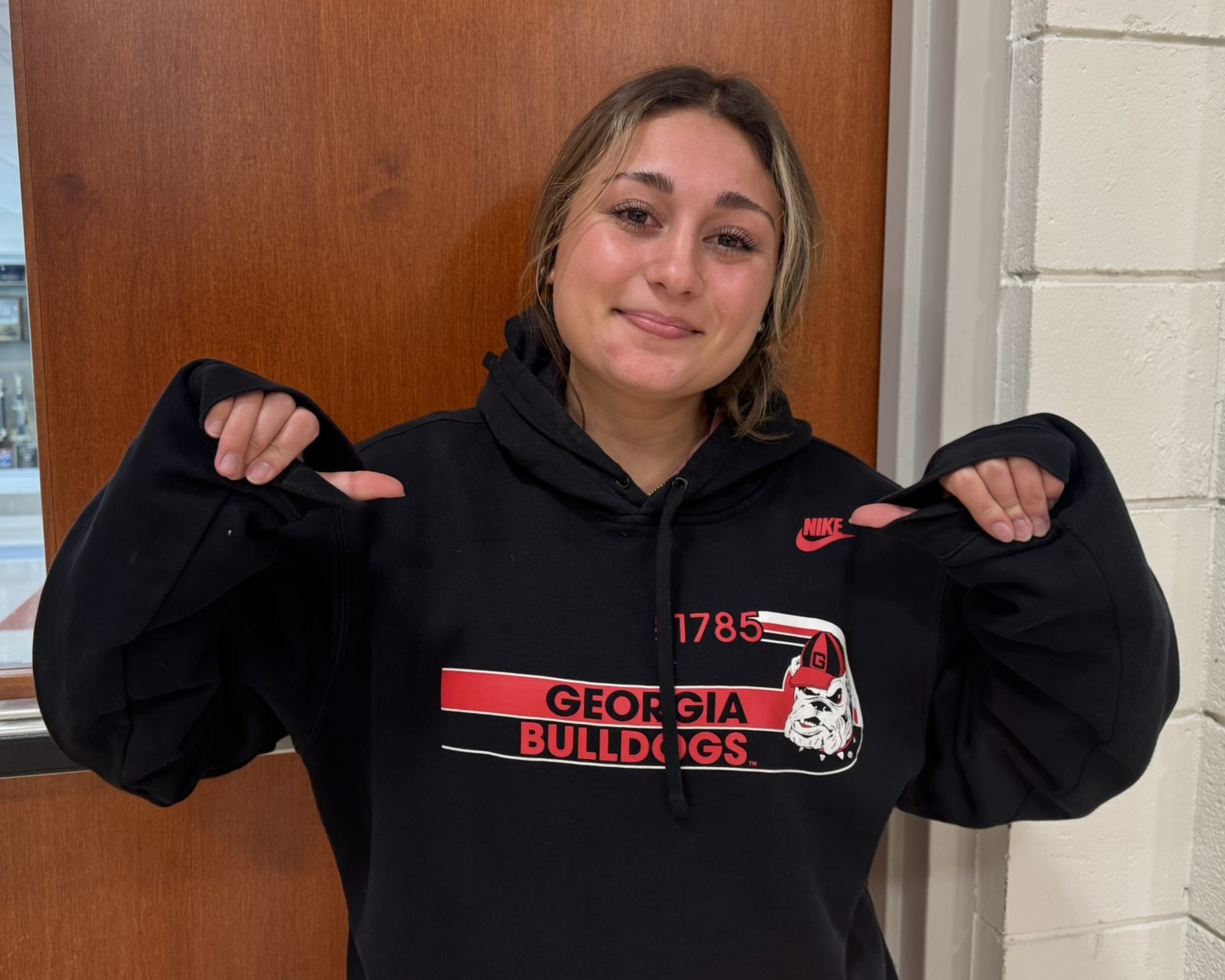 Senior Ava Hustek wears a University of Georgia sweatshirt.