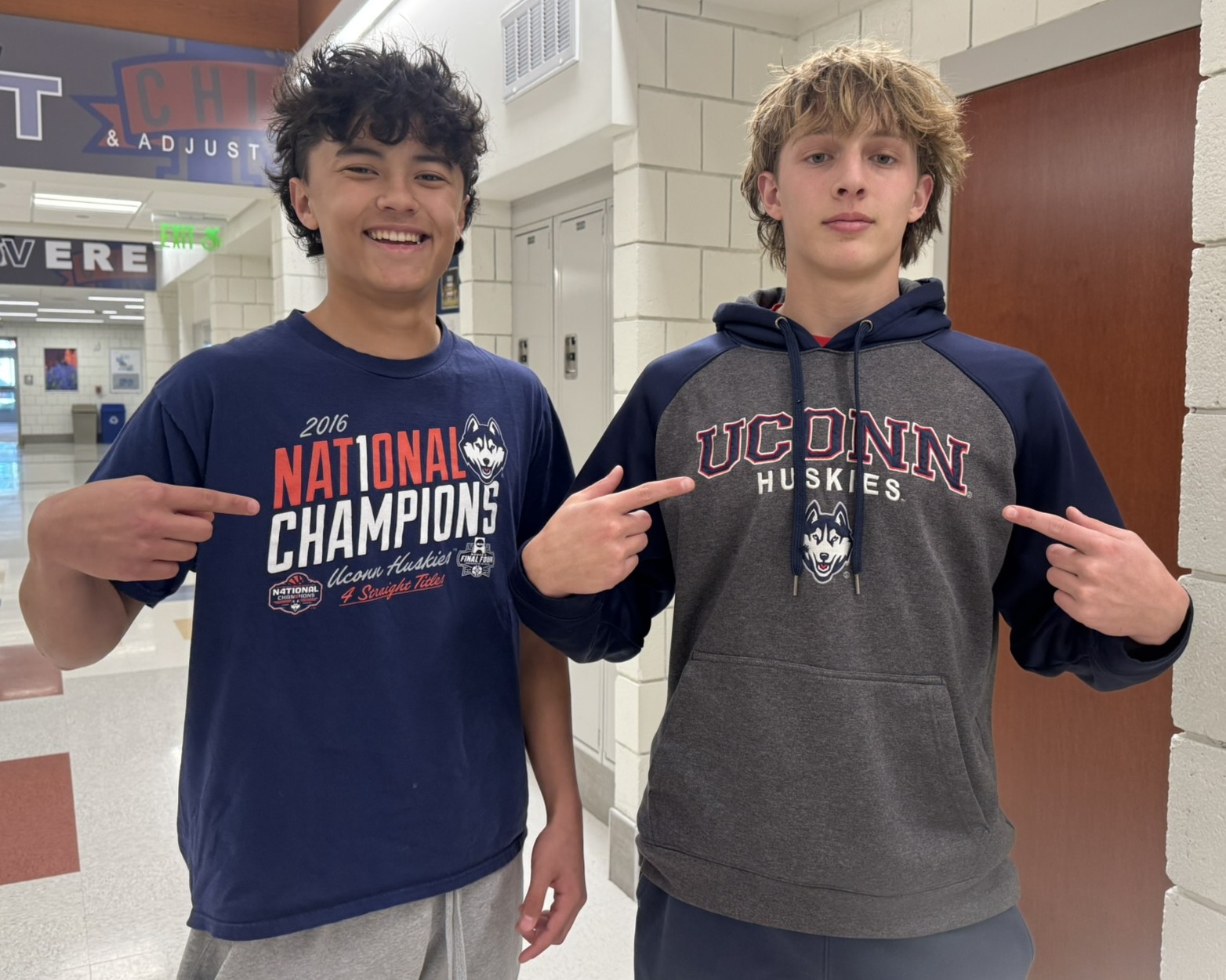 Juniors Derek Chung, left, and Robert Metcalfe wear UConn apparel as they begin to think about post-secondary options.