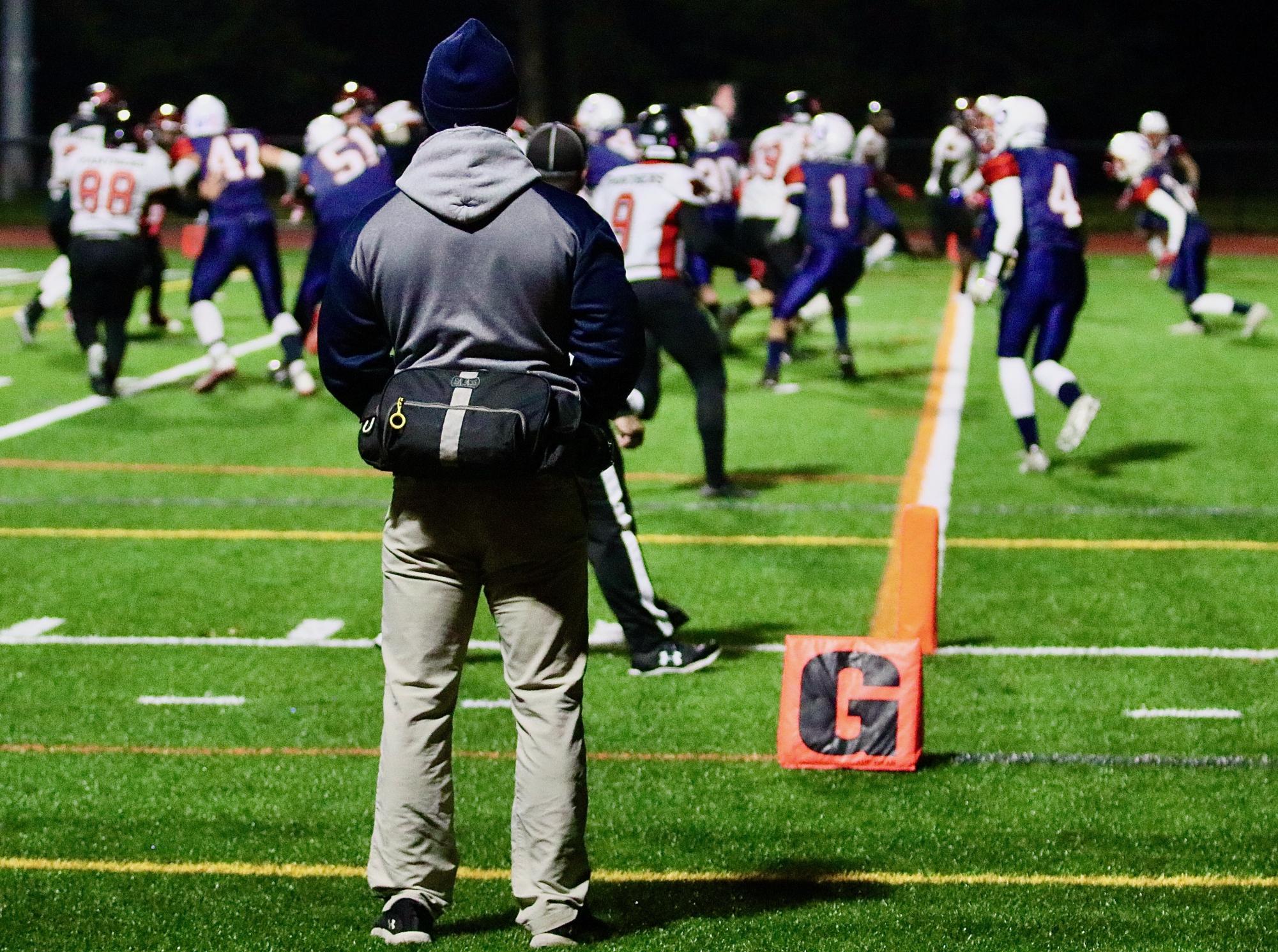 Sean McGee watches a play during a 2022 Northwest United football game at Nonnewaug. (Courtesy of Noreen Chung)