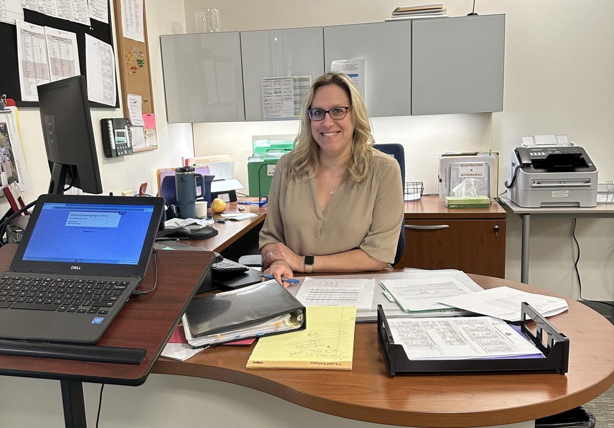 Amy Parks greets students at her desk in the Nonnewaug counseling office.