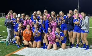 The Nonnewaug girls soccer team poses after winning its Class M quarterfinal against New Fairfield on Nov. 7. (Courtesy of Kyle Brennan)