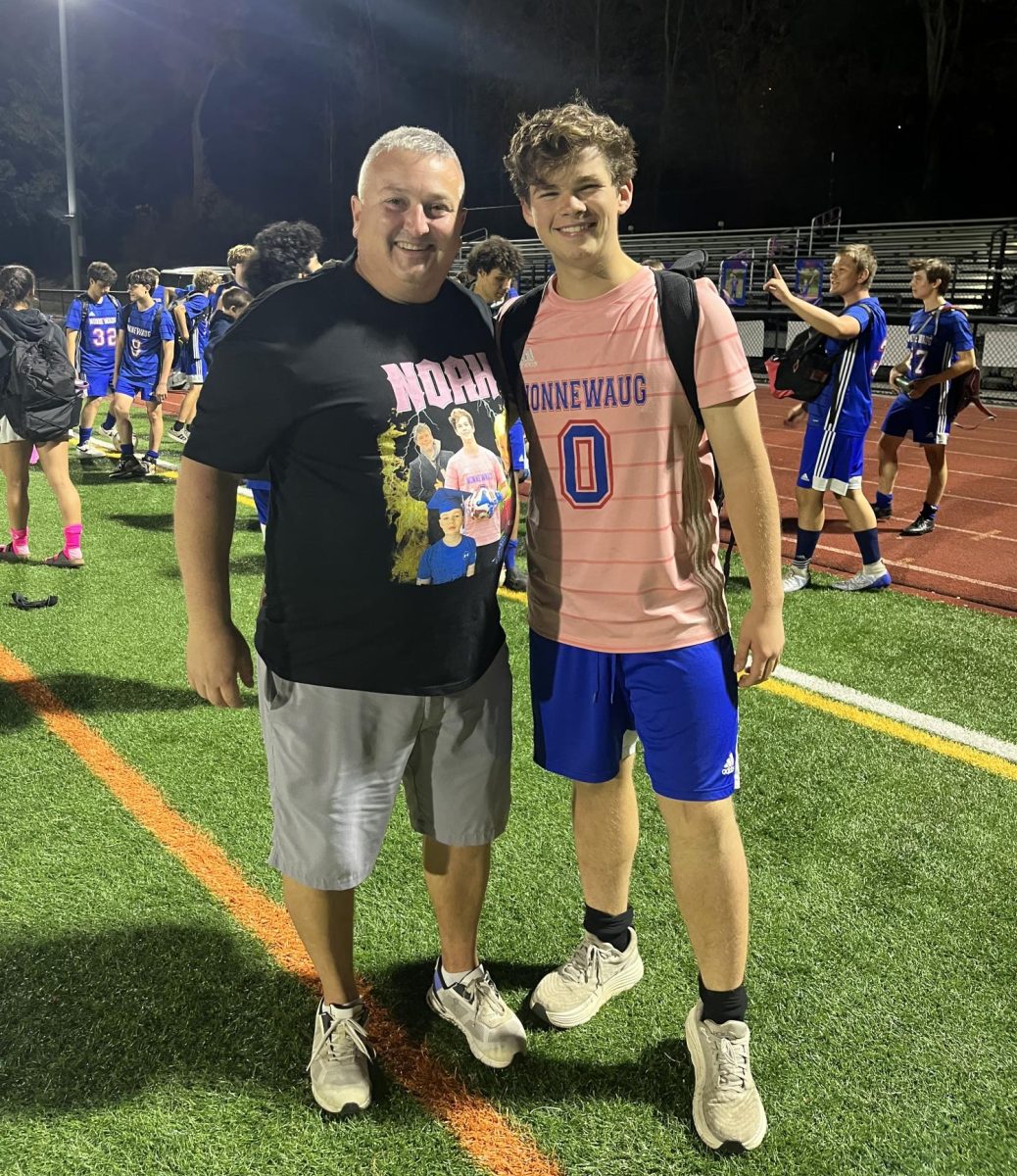 Coach Toby Denman celebrates Noah’s senior night by wearing him on his t-shirt. A bittersweet moment Noah and Denman share concludes the end of Noah’s high school soccer career, but Denman has no doubt that they will maintain some sort of relationship after he graduates, “hopefully a close one.” (Courtesy of Toby Denman)