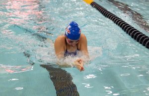 Grace pulls through in the Breaststroke leg of the 200 Medley relay. It's not only in the pool that Walkup has built her reputation as a leader, but rather it’s personified in everything she does. Photo Credit - Derek Ward