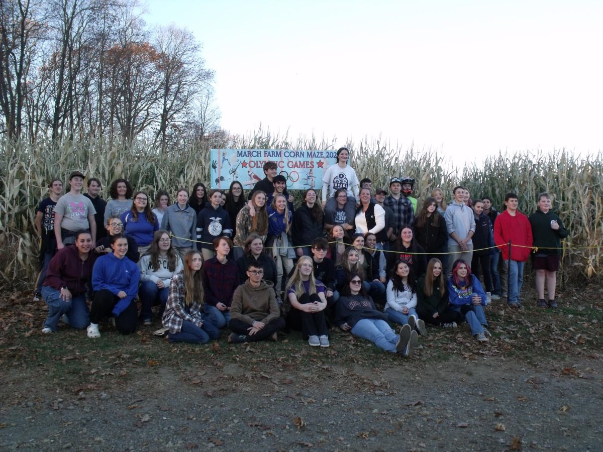 Woodbury and Wamogo FFA students pose for a group photo in front of the corn maze on Nov. 8 at the District 1 social.