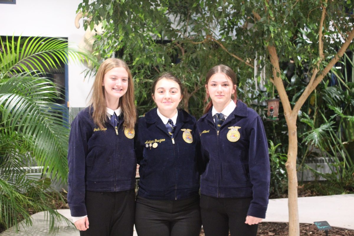 From left, Danielle Falls, Ashlynn Graziano, and Mallory Jean Johnson composed the poultry judging CDE this fall. The team was not complete with only three people. (Courtesy of Katie Gorman)