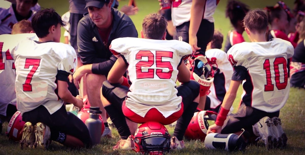  From left, Derek Chung, Brady Herman and Robert Metcalfe listening to coaches. (Courtesy of Noreen Chung)