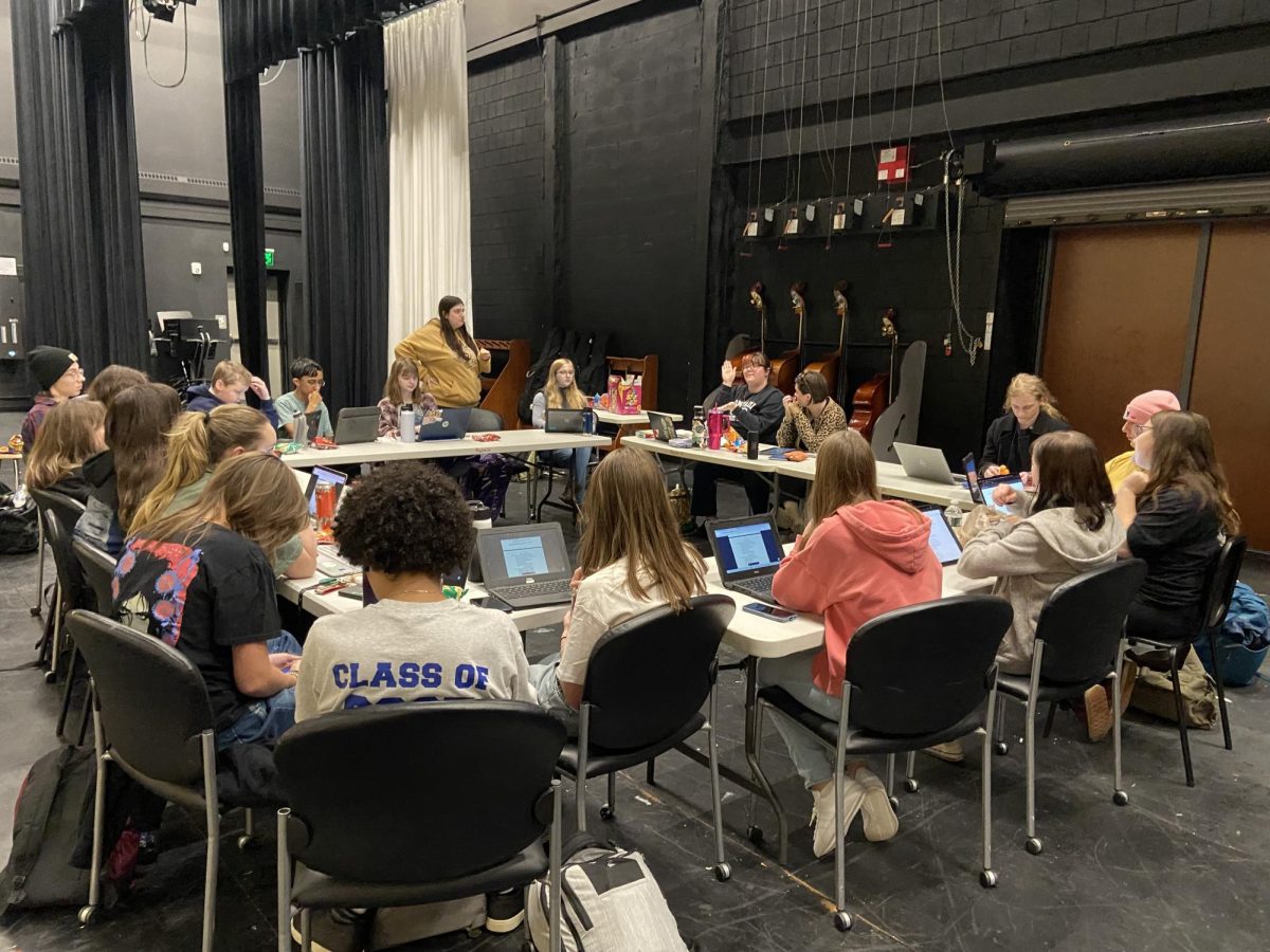 Drama club members sit down with director Catherine Pelkey, script reading and going over songs in this spring’s musical. This year’s musical will feature the play Godspell and debut Thursday, April 2nd.