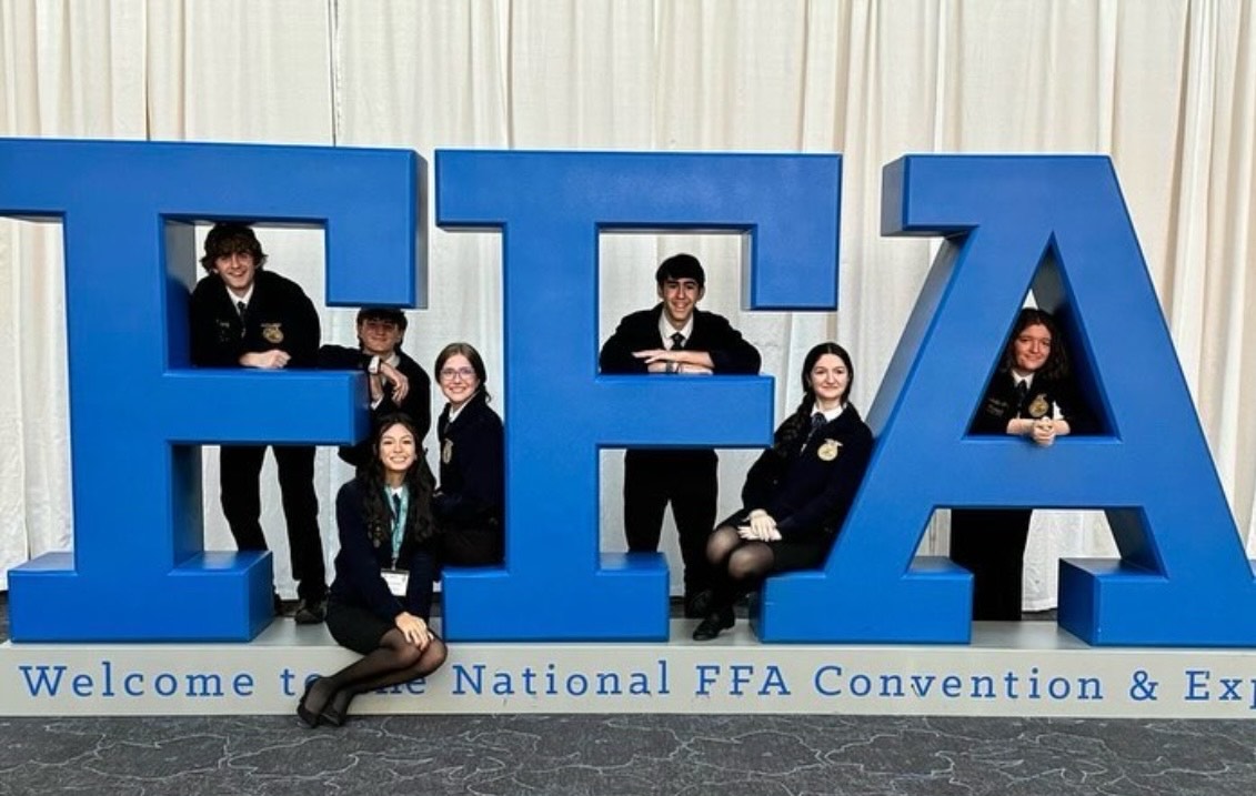 From left Nate Berry, Connor Cabeleira, Mia Lyseca, Abegail Diezel, Luciano Pedros, Merije Iljazi, and Isabella Longely. This was Diezel’s second and potentially final time attending FFA Nationals. (Courtesy of the Woodbury FFA Instagram)