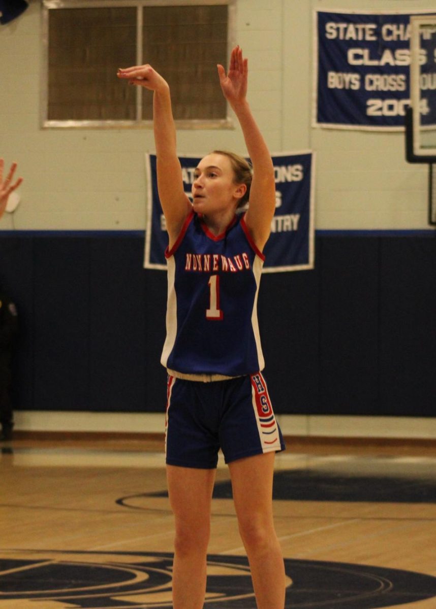 Freshman Gemma Hedrei shoots the ball during Nonnewaug girls basketball game against Shepaug on Jan 3.  